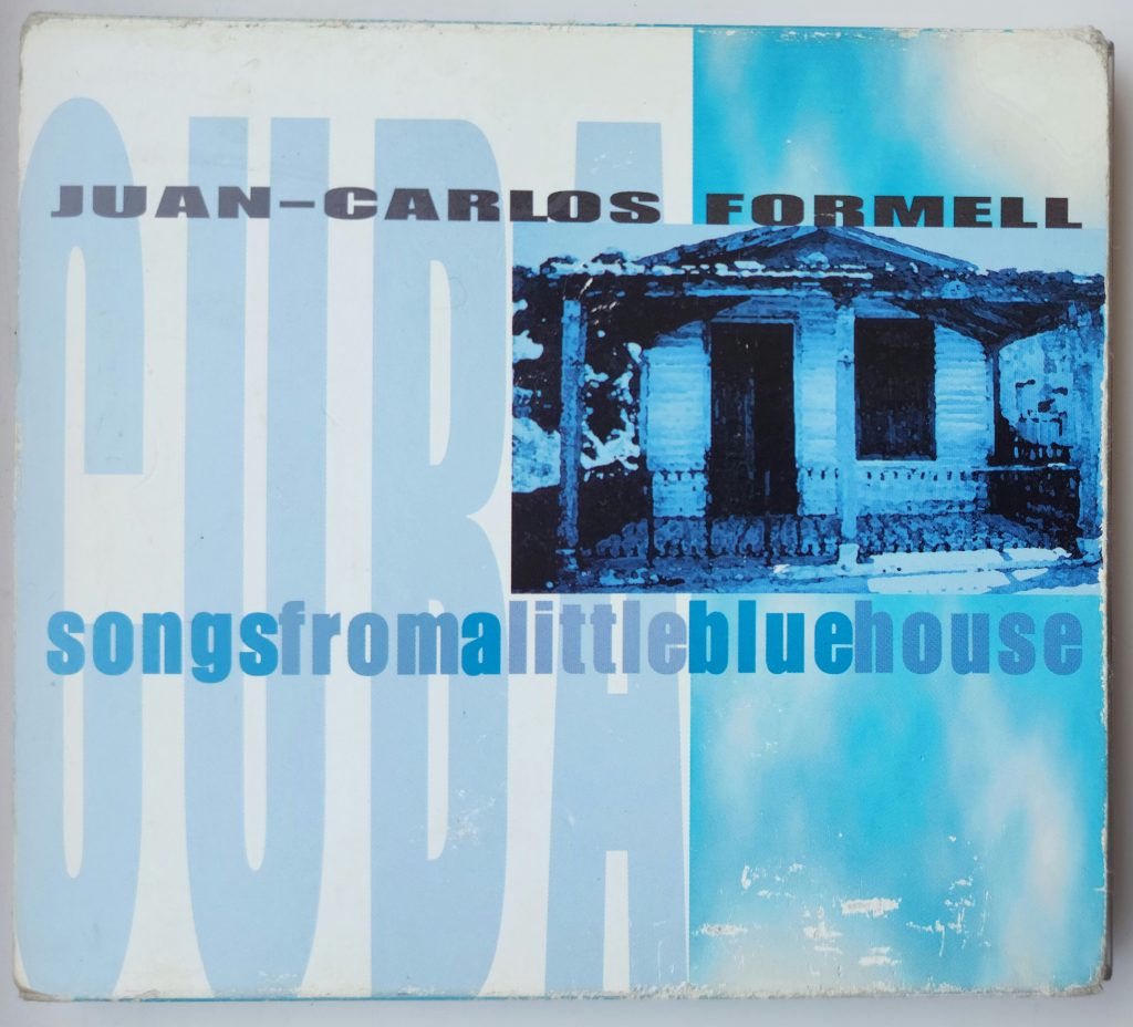 Album Cover: Songs From a Little Blue House (Juan-Carlos Formell)